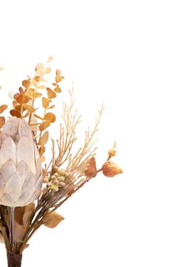 Bouquet artificial con Protea en tonos otoñales