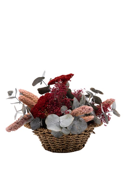 Cálido y encantador centro de flores en tonos granates