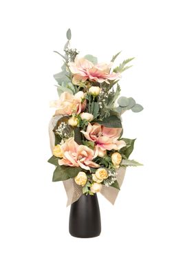 Espectaculares flores de magnolio artificial para este ramo de flores de cementerio.