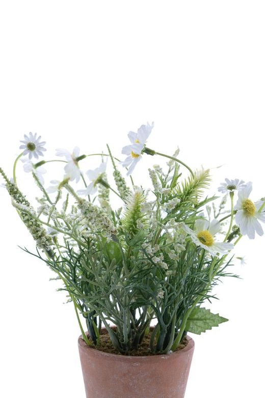 Pequeña maceta de flores artificial con base de terracota