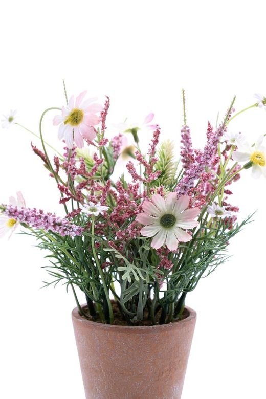 Pequeña planta de flores artificiales en color rosa con base de terracota