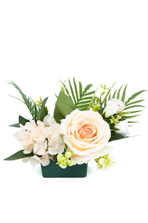 Pequeño centro floral de cementerio cálido en crema y rosados
