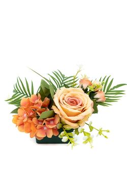 Pequeño centro floral de cementerio intenso en tonos naranjas