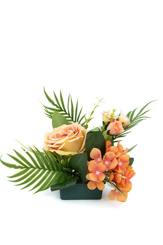 Pequeño centro floral radiante de cementerio en naranjas