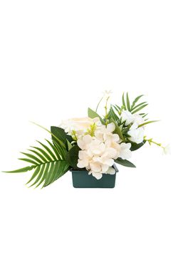 Pequeño centro floral refinado de cementerio en tonos crema