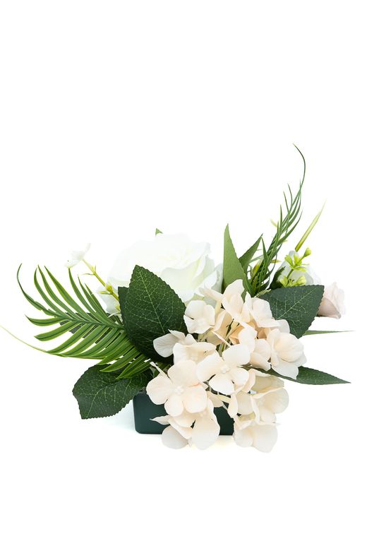 Pequeño y sereno centro floral en blancos y crema
