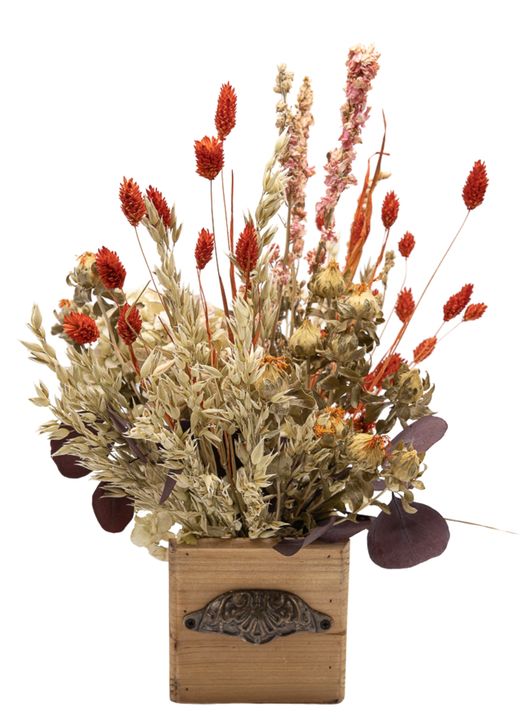 Radiante centro de flores secas y preservadas en tonos cálidos