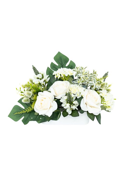 Serenidad en esta jardinera floral de cementerio en tonos claros