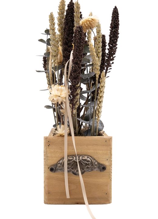 Sofisticado centro de flor seca en tonos marrones y naturales