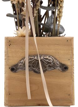 Sofisticado centro de flor seca en tonos marrones y naturales