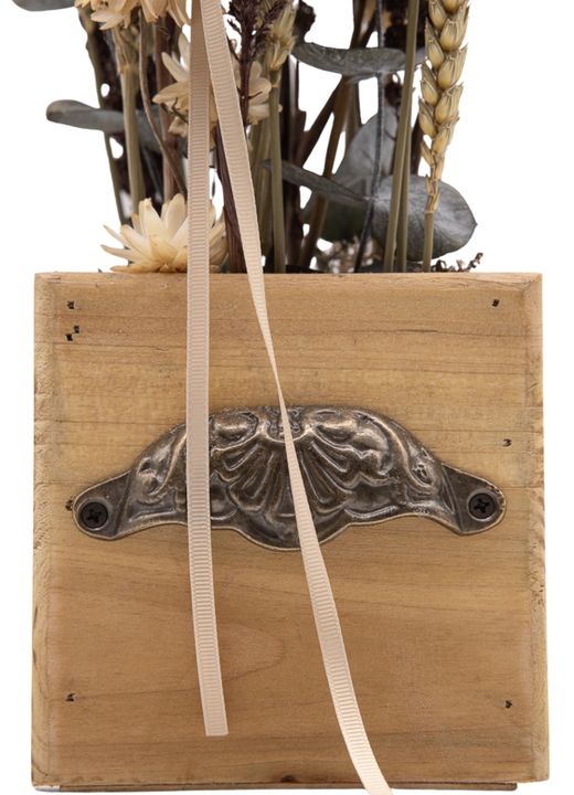 Sofisticado centro de flor seca en tonos marrones y naturales