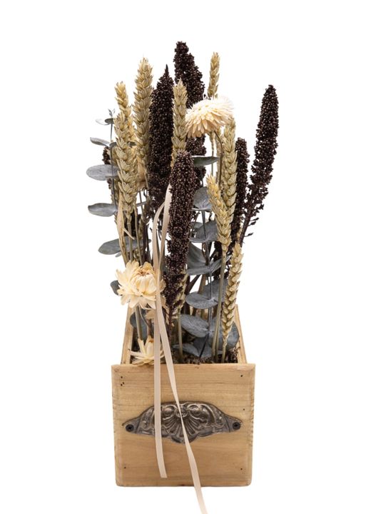 Sofisticado centro de flor seca en tonos marrones y naturales