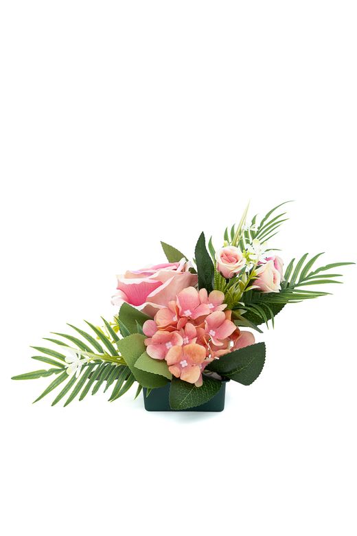 Sutil pequeño centro floral de cementerio en rosa y malva